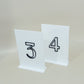White & black table numbers